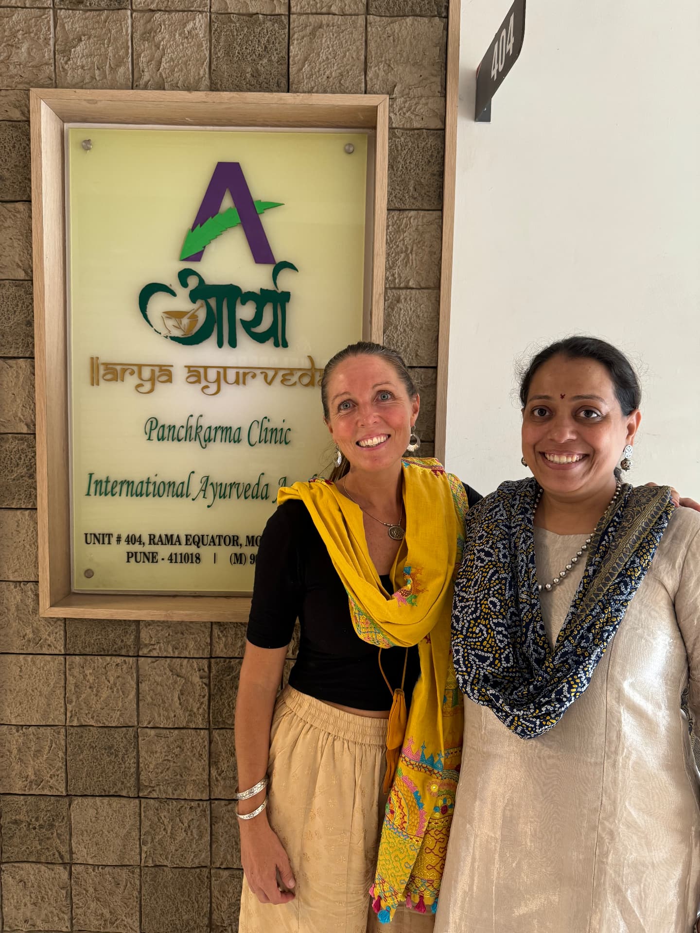 Carlisle with Dr. Amruta outside the Arya Ayurveda panchakarma clinic in Pune