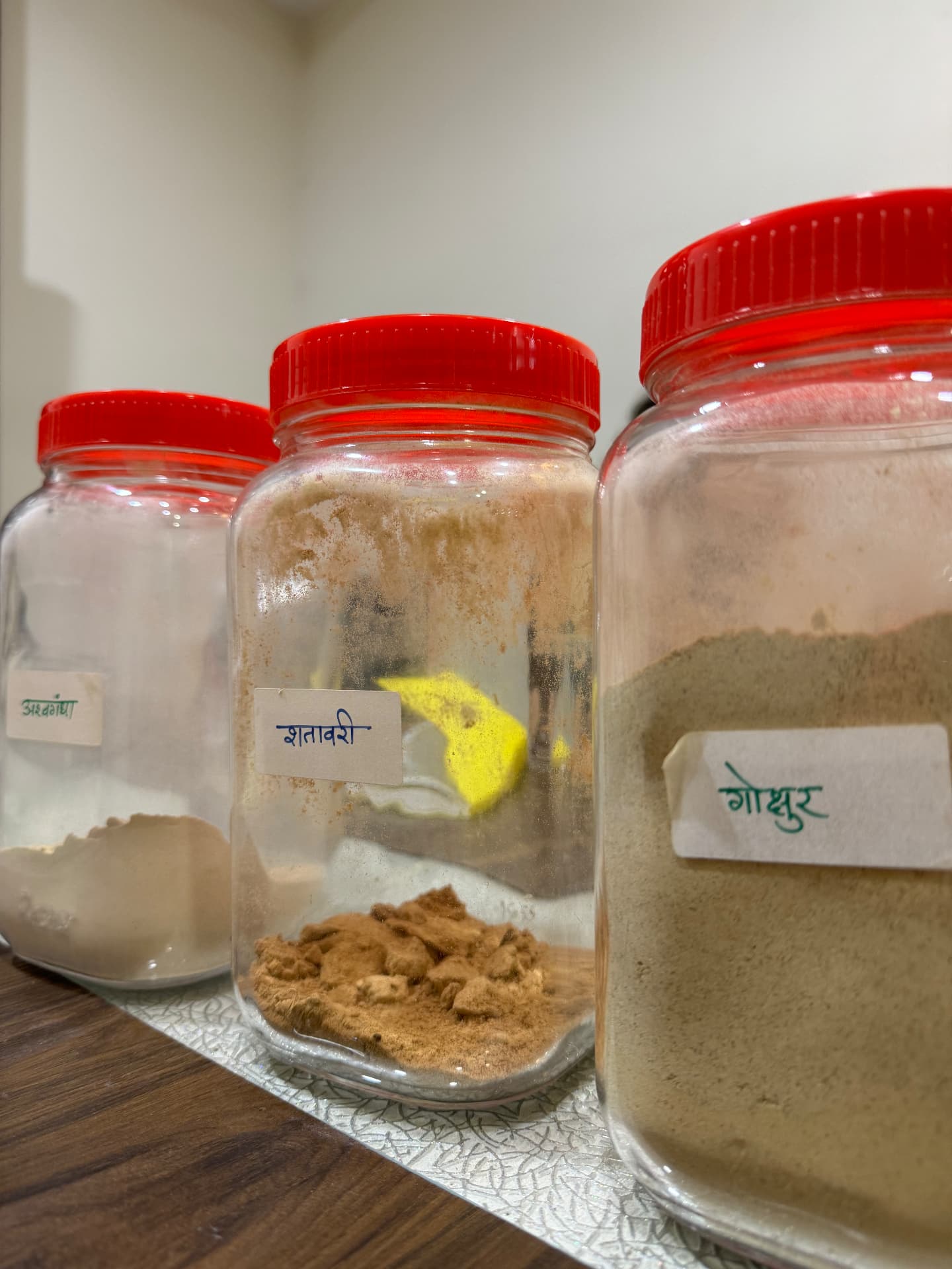Herb jars on the Maha Vidya dispensary shelf